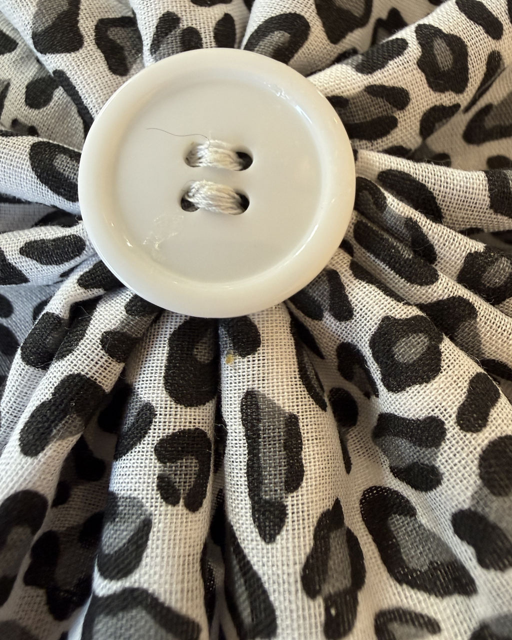 Snow Leopard Collar Blossom — closeup view | Hector's Threads