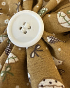 Up & Away Collar Blossom — closeup view | Hector's Threads